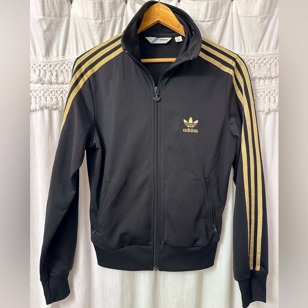Unisex black with gold stripes and logo Adidas track suit jacket size M women’s